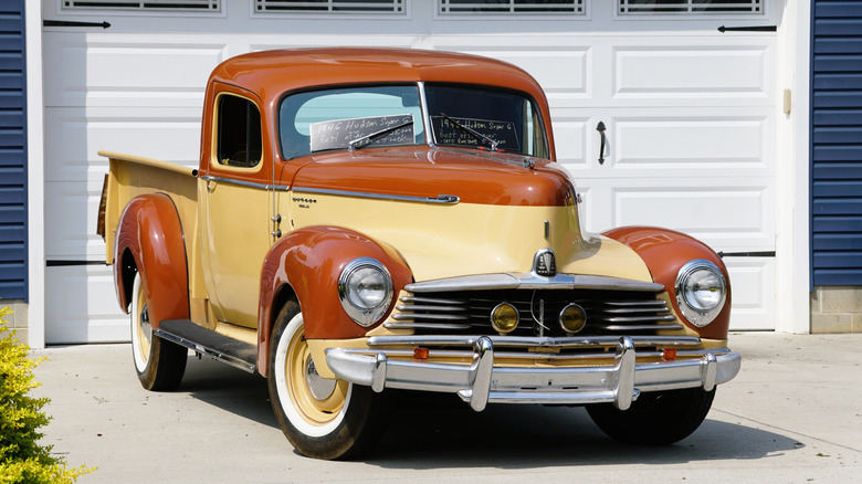 A Hudson Motor Car company pickup truck parked on a driveway