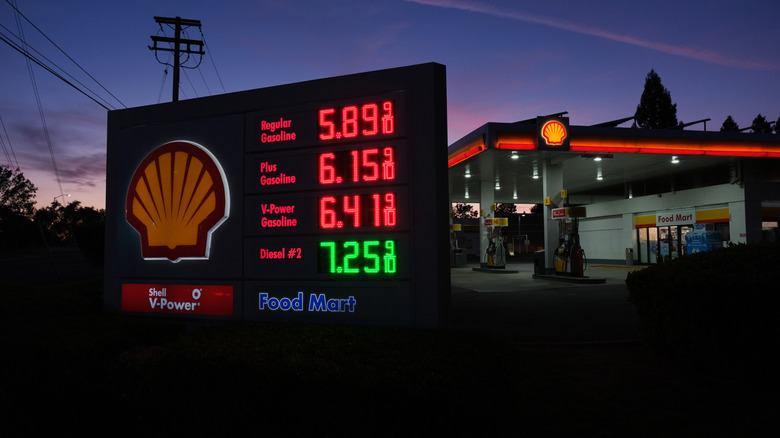Night time view of gas prices at Shell station in California.