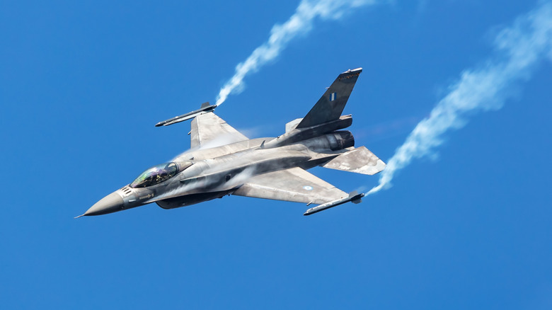 F-16 generating wing vortices while in flight