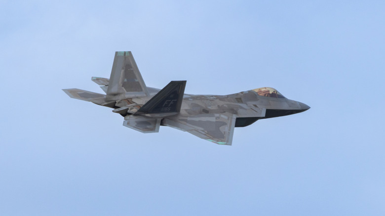 F22-A Raptor against a hazy sky