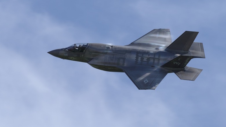 an F-35 Lightning II taking a low pass
