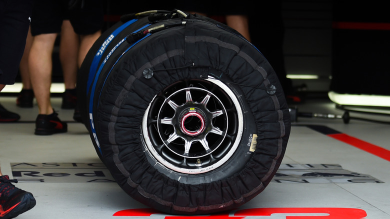 Set of Formula One tires with blankets on