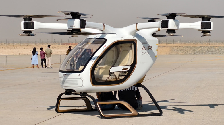 An eVTOL grounded on an airfield.