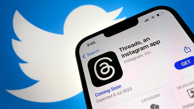 Threads on App Store, Twitter old logo in background