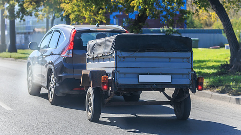 Family car towing light trailer