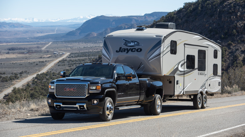 GMC truck towing camper