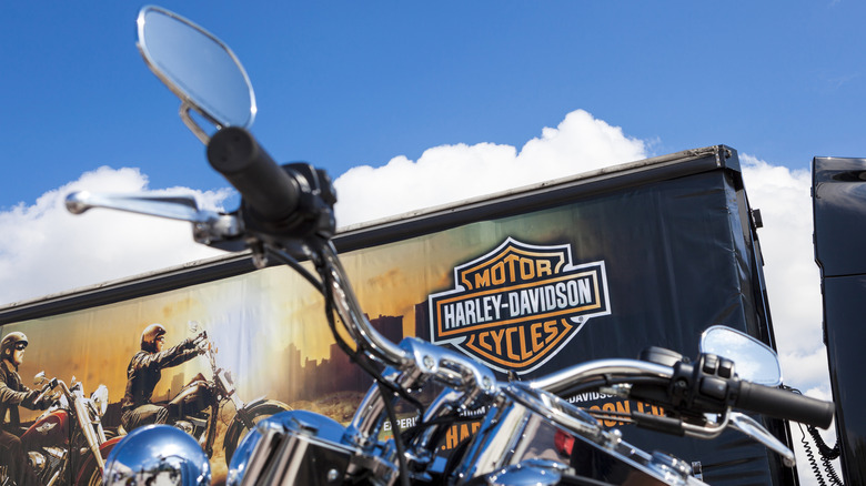 Harley Davidson logo behind bike handlebars