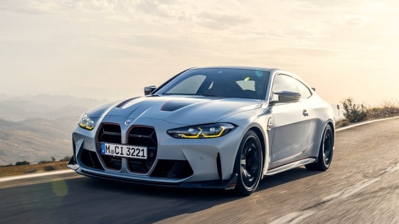 BMW M4 CSL driving on a road