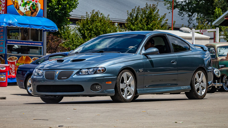 Person driving a 2006 Pontiac GTO