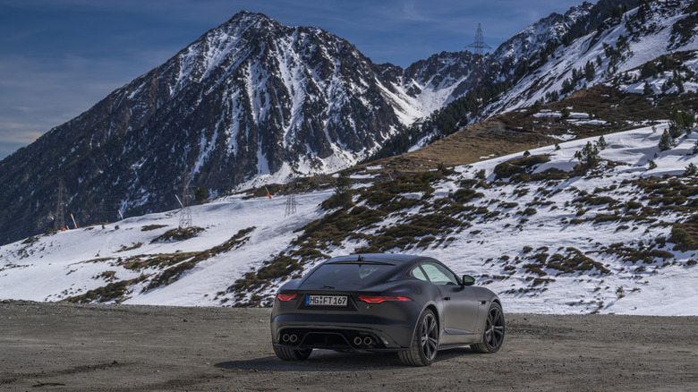 2024 Jaguar F-Type rear three-quarter by a mountain