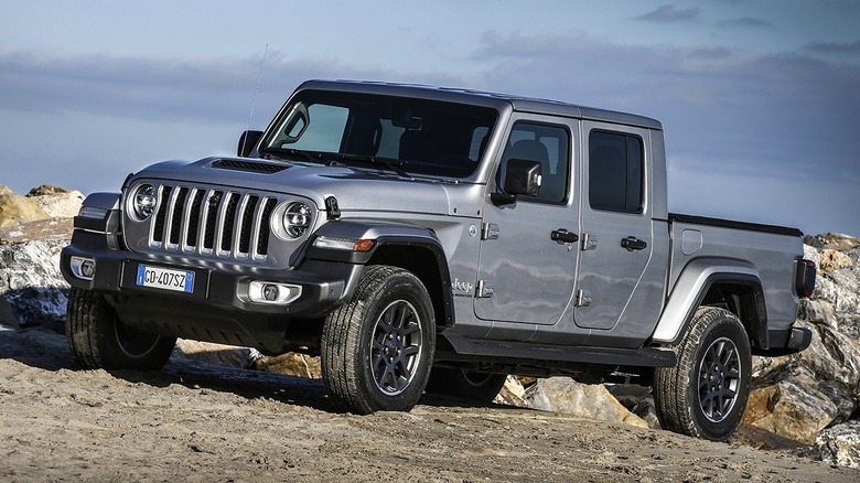 Silver 2021 Jeep Gladiator Overland parked on rough terrain