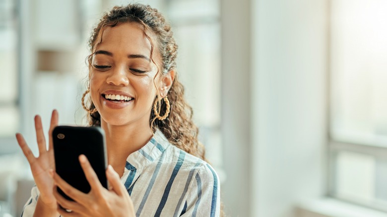 woman using her phone