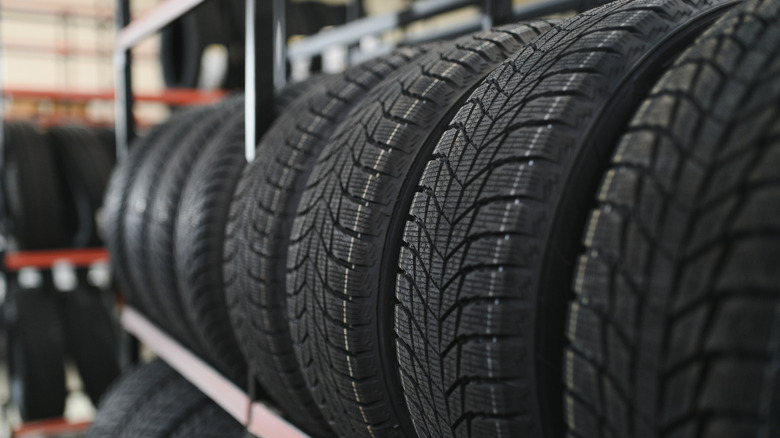 Tires for sale on rack in store