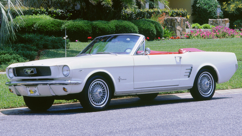 Side shot of a white 1965 Ford Mustang Convertible