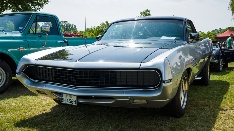 A front-end view of a green 1970 Ford Ranchero GT