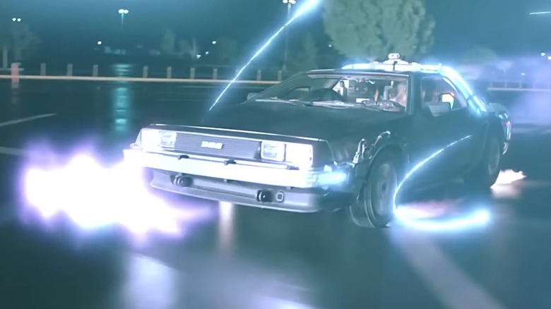 The DeLorean in "Back to the Future" surrounded by flashes of light.