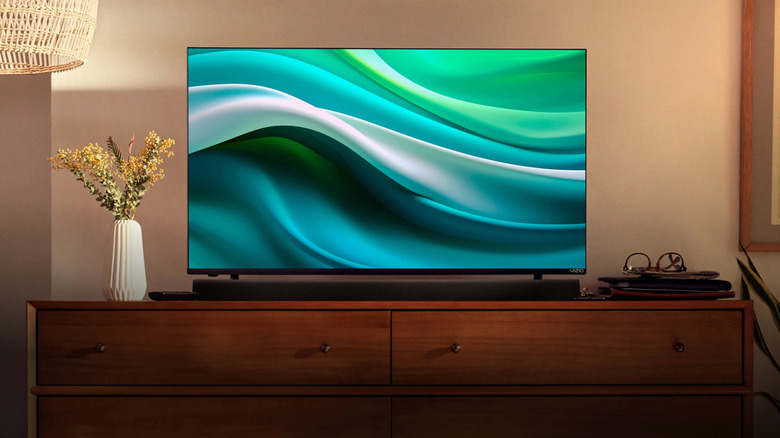 A Vizio TV on a drawer, displaying an abstract image