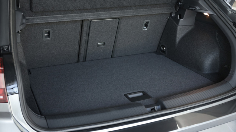 A clean, empty cargo space in the rear of an SUV.