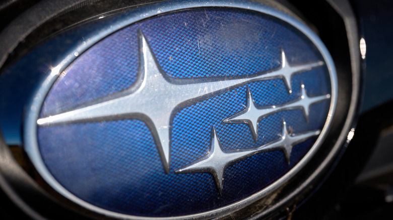 A close-up of a Subaru brand badge.