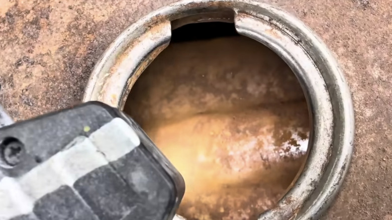 A rusted motorcycle fuel tank