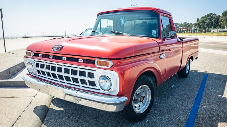 A red 1965 Ford pickup truck fitted with a 300-cubic-inch inline-6