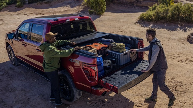 people loading f-150 bed