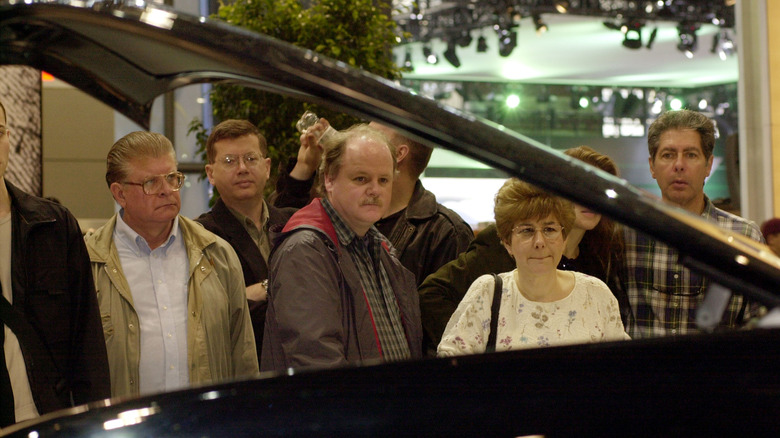 Visitors looking at Ford Forty-Nine