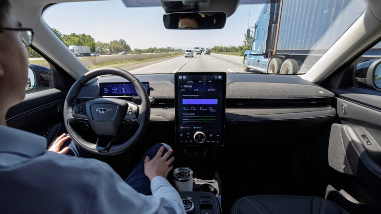 Man in Ford car using BlueCruise