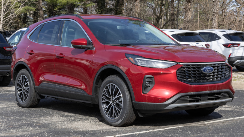 A red Ford Escape in a parking lot.