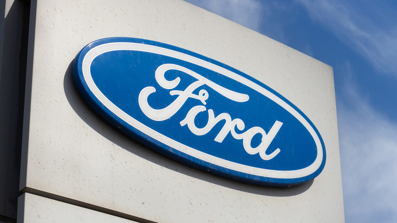 The Ford logo on an outdoor sign.