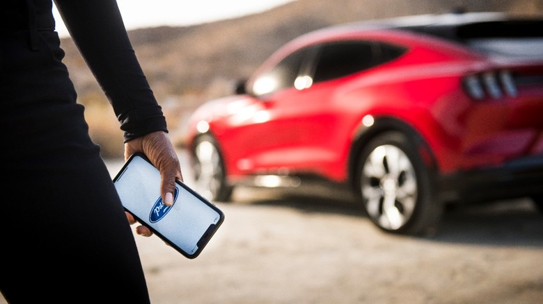 Driver with car and smartphone
