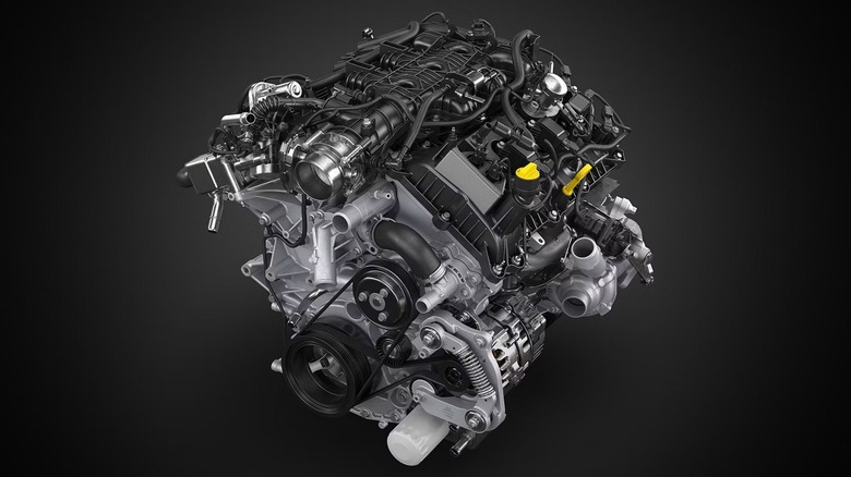 The Ford 5.0L Coyote V8 engine against a black background.