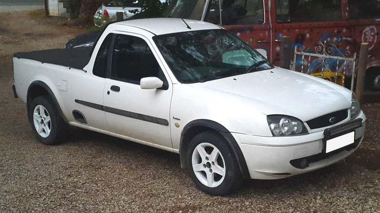 A white Ford Bantam pickup truck, first facelift