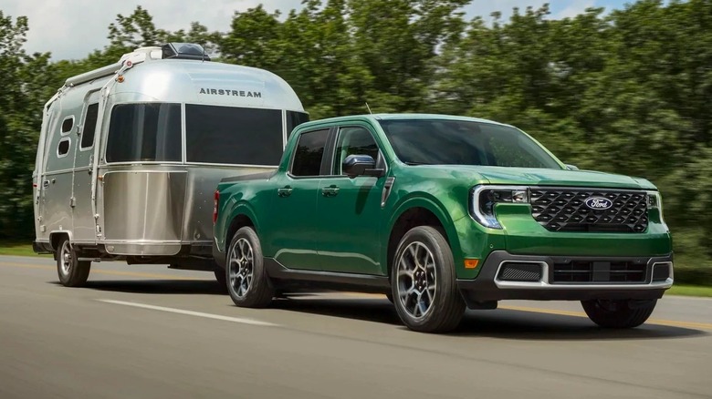 3/4 shot of a 2025 Ford Maverick towing an Airstream trailer