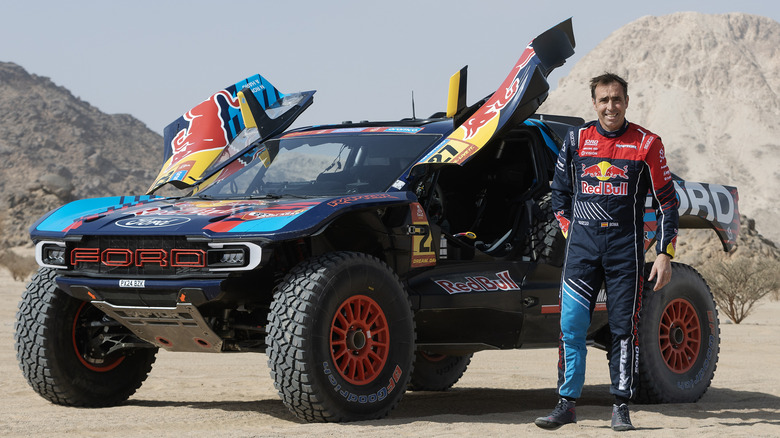Front 3/4 view of Ford rally car with driver Nani Roma in Dakar Rally in Saudi Arabia