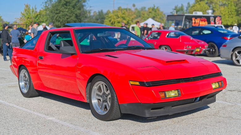 Front-quarter shot of a red Chrysler Conquest TSi