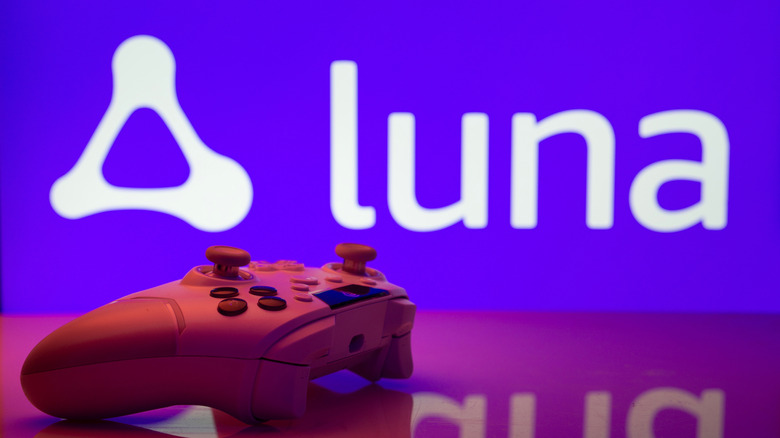 A gaming controller with Luna logo in the back