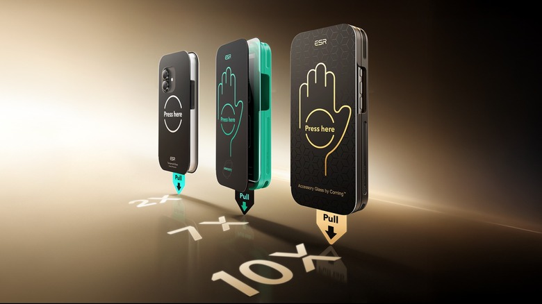 Screen protectors on three phones with gold and black background