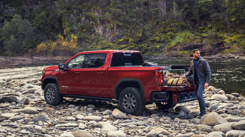 2026 GMC Sierra with truck bed being used for fishing in woods