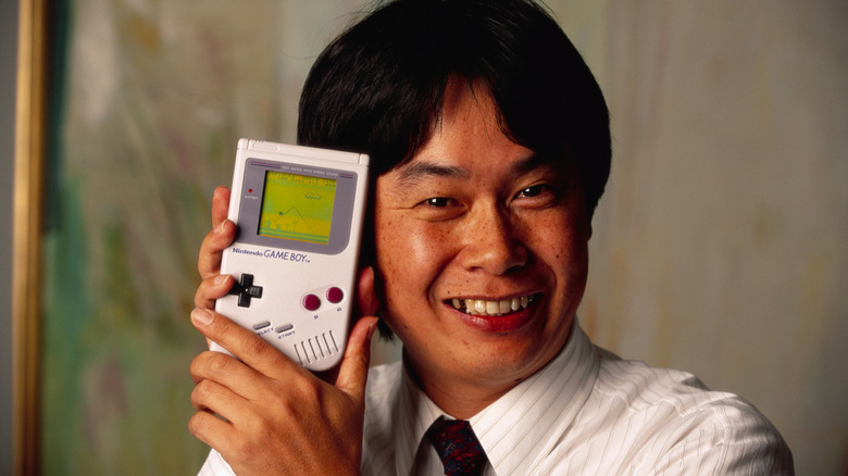 Shigeru Miyamoto with Gameboy