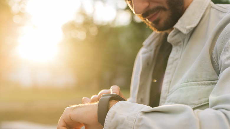 Man looking at watch
