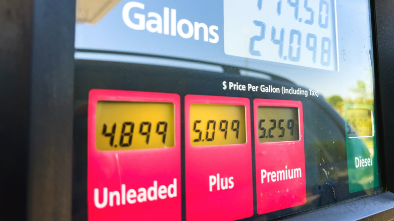 A gas pump showing prices per gallon of over $4.89