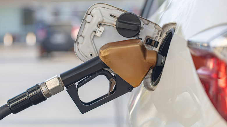 Car filling up at pump
