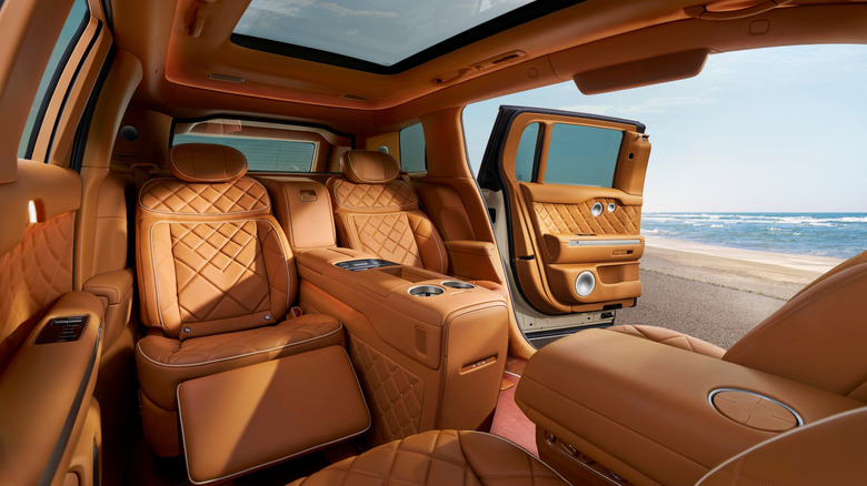 2027 Genesis GV90 SUV interior with the coach doors open