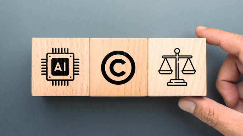 Wooden blocks showing AI chip, copyright, and scale imagery