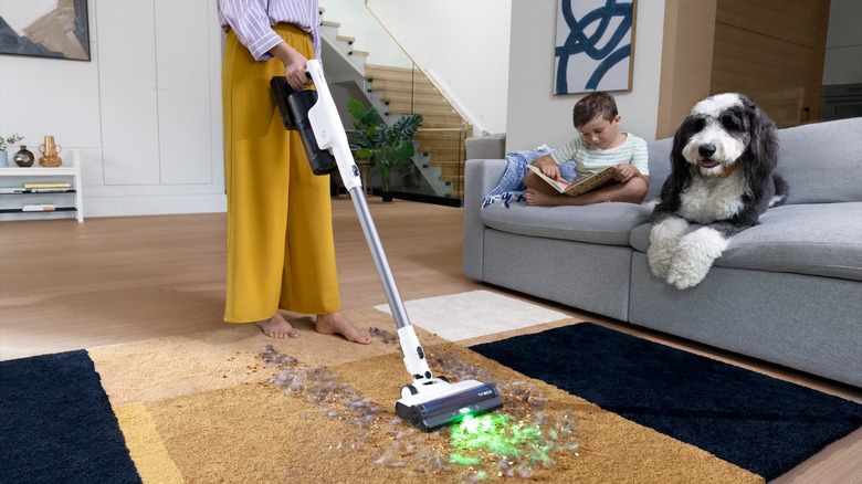 Tineco PURE ONE STATION 5 vacuum cleaning a mess
