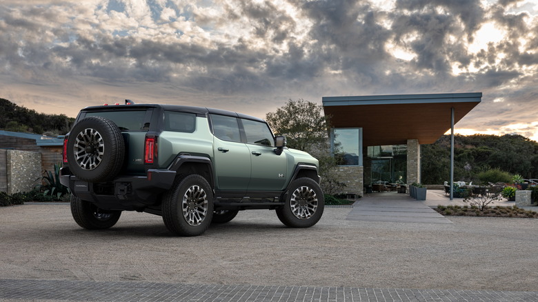 Hummer EV SUV and house