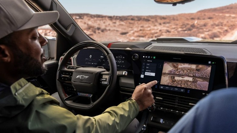 A man using GM's new infotainment system