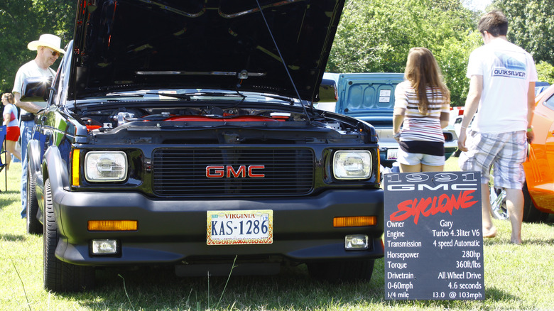 GMC Syclone at show with info board