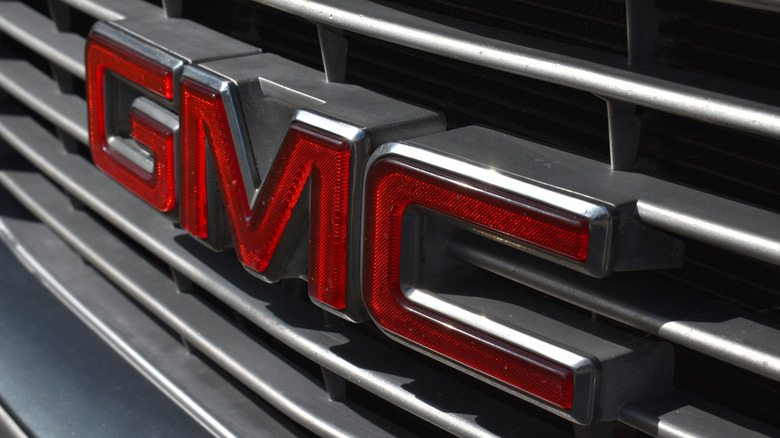 Older GMC badge on front of vehicle